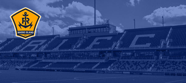 Stadium with 'Rhode Island FC' branding and logo on a blue filter